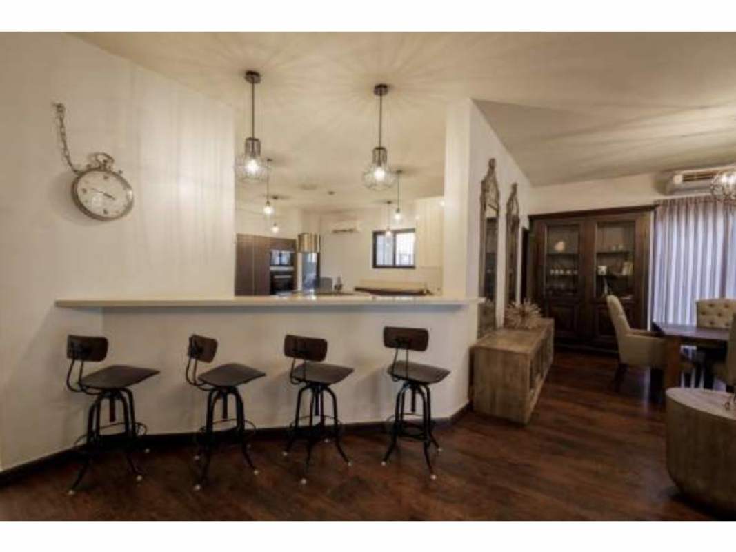Elegant dining room with chandeliers open plan Embassy Club Clayton