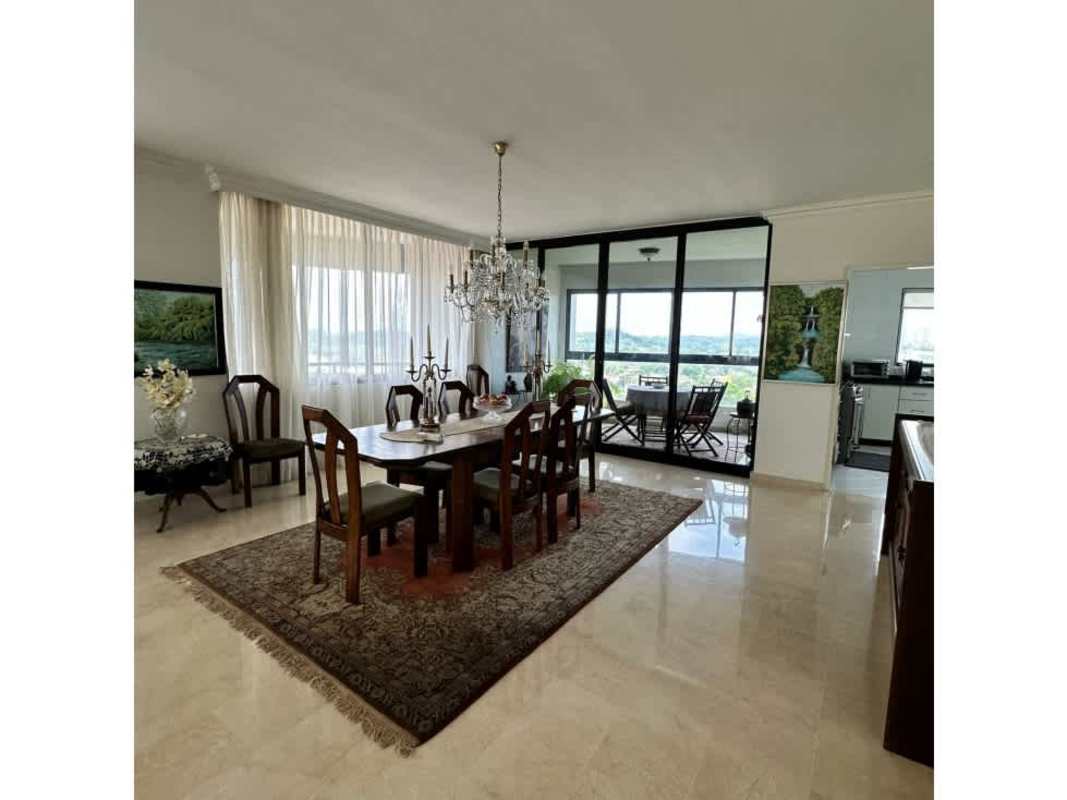 Spacious living room with marble floors and floor-to-ceiling windows at PH Elite La Cresta Panama City