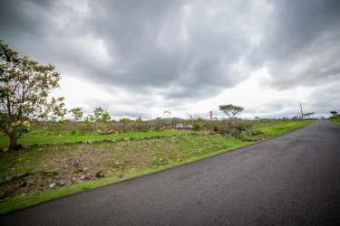 Vacant commercial corner land at entrance of Hacienda Los Molinos, Boquete Highway Panama