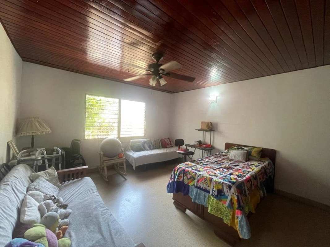 Entry corridor with wooden ceiling and reception area commercial house for rent Panama City