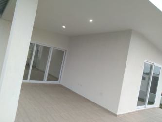 Covered terrace with sliding doors backyard The Village Beach Residence San Carlos Panama