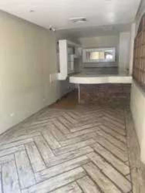 Bar counter kitchen area with herringbone tile flooring commercial property Panama City