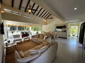 Open plan living dining room vaulted ceilings Decameron Town Center villa