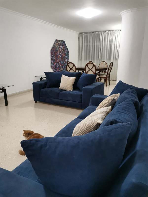 Spacious living and dining room with marble floors, open layout and natural light at PH BICSA Financial Center