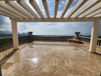 Expansive marble terrace with white pergola and stunning ocean views at The Alcazar Coronado Panama