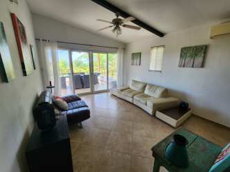 Open kitchen with island and modern appliances in Gorgona Coronado beach villa Panama