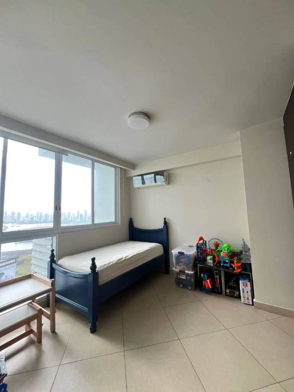 Living area high rise floor-to-ceiling window ocean view Costa del Este