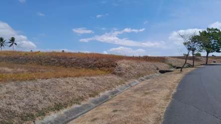 Gentle sloping lot in secure Vista Mar resort ready for luxury home build