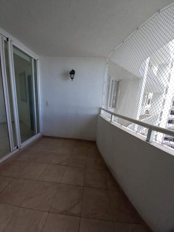 Balcony overlooking the Pacific Ocean, glass rail, safety net at PH BICSA Tower Panama City