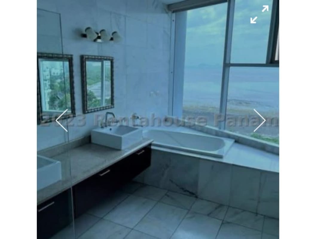 Bathroom with bathtub, marble countertops, dual sinks and stunning ocean views in Costa del Este