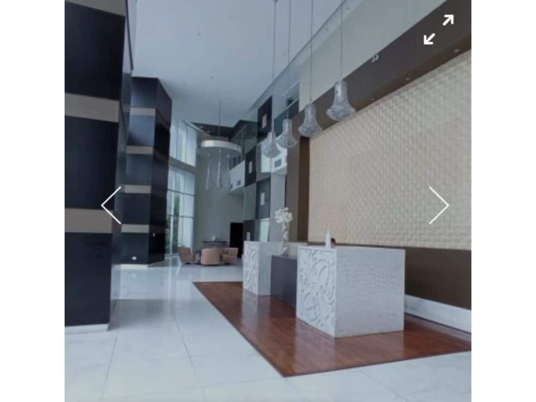 High ceilings, large windows, modern reception area at Pearl at the Sea Costa del Este Panama