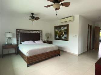 Luxury kitchen with granite countertops and breakfast bar in beachfront villa Bijao Panama