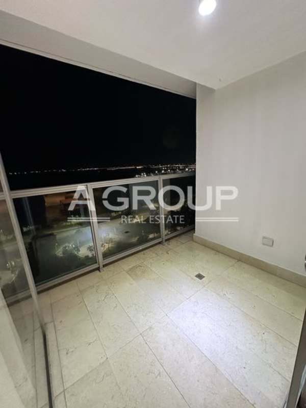Balcony featuring panoramic views of the ocean and Panama City skyline