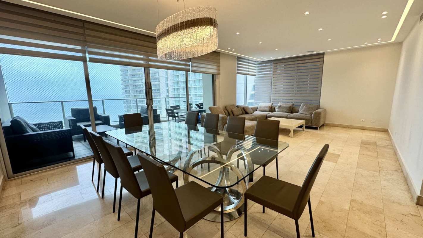 Spacious master suite with large windows at PH Pacific Village Panama City