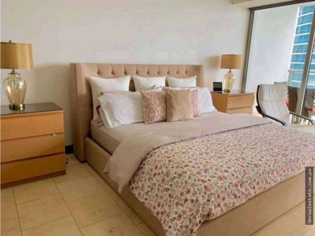 Modern bathroom with glass walk-in shower and marble countertop at PH The Ocean Club Punta Pacifica Panama