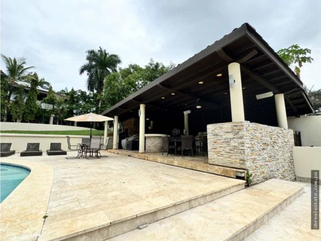 Formal dining area with high ceilings and garden views luxury house Clayton Panama