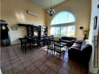 Large covered terrace with hammocks and garden view in Coronado Panama villa rental