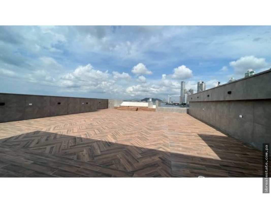 Rooftop terrace with private infinity pool overlooking Ocean Reef marina and city skyline Panama City