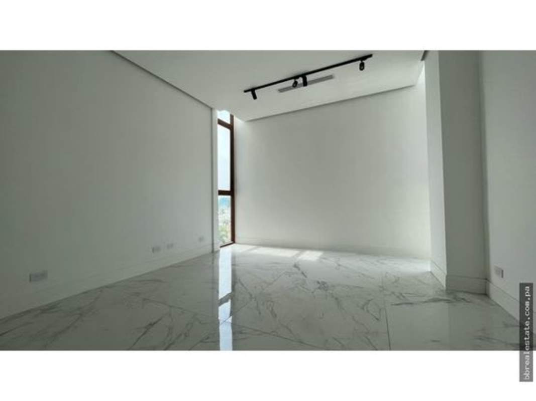 Luxury modern bathroom with marble finishes, glass shower and large vanity in PH Ocean Reef Islands Panama