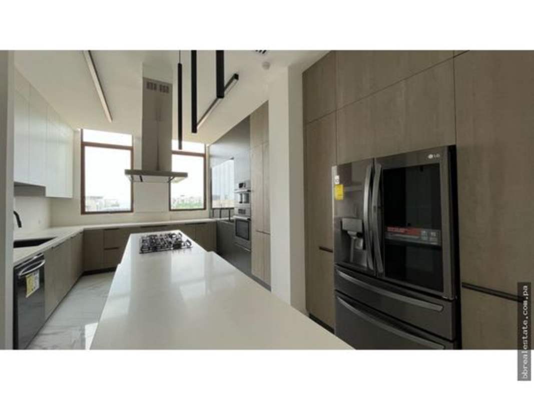 Master bedroom suite featuring floor-to-ceiling windows with panoramic marina view in PH Ocean Reef Islands Panama