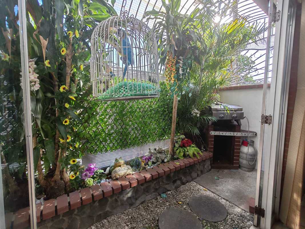 Covered parking with security features garden and gated entrance Altos de Panama