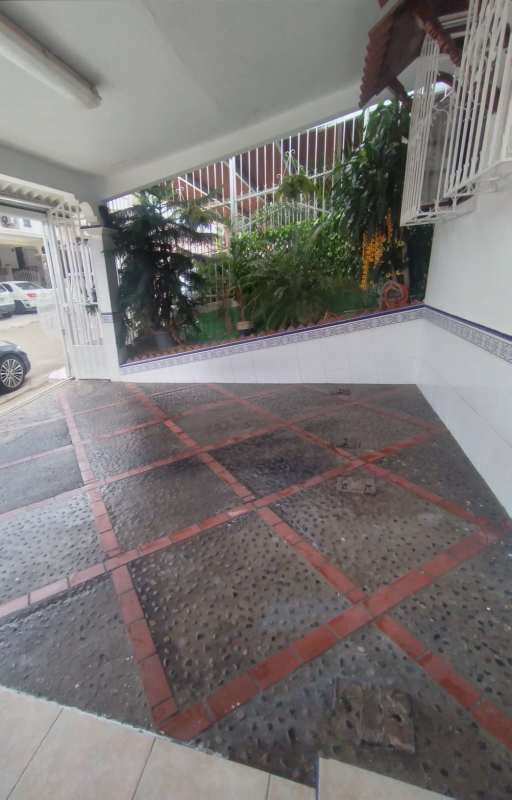 Double height living area with stairs, ceiling fans and patio access Condado del Rey