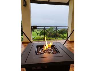 Luxury mountain home with outdoor fire pit terrace overlooking golf course at Lucero Boquete Panama