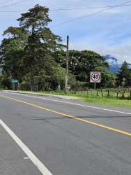Vacant cleared lot near Volcán entrance bordering the main highway in Chiriquí, Panama