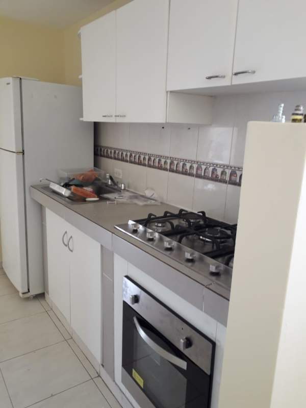 Bright bedroom with built-in closets and tiled floor in Condado del Rey Panama apartment for sale