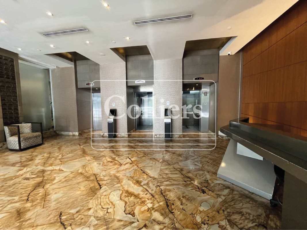 Large modern reception area with marble floors and elevators in Torre Twist Obarrio
