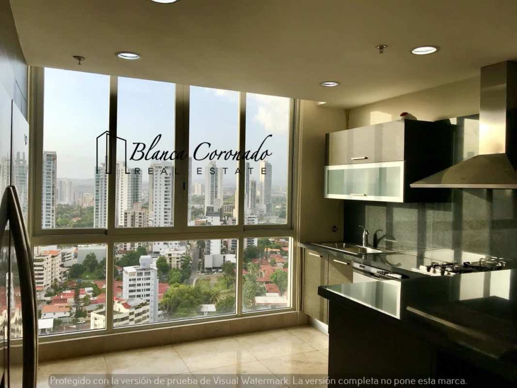 Bright second bedroom with large windows and city view PH Ocean Sky Coco del Mar Panama City
