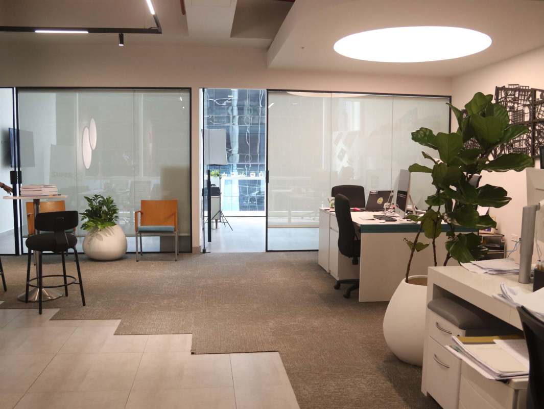 Private office space with glass walls and view of Santa María Panama