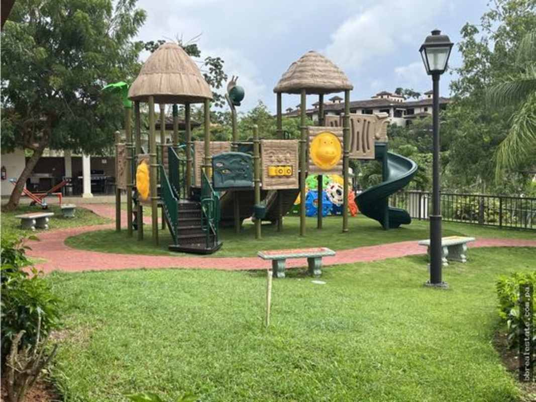 Outdoor tennis court and gardens PH Embassy Village Clayton Panama