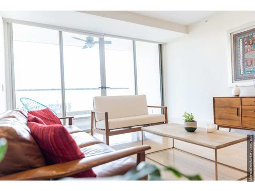 Spacious living room with panoramic windows at PH Greenview Santa Maria Panama