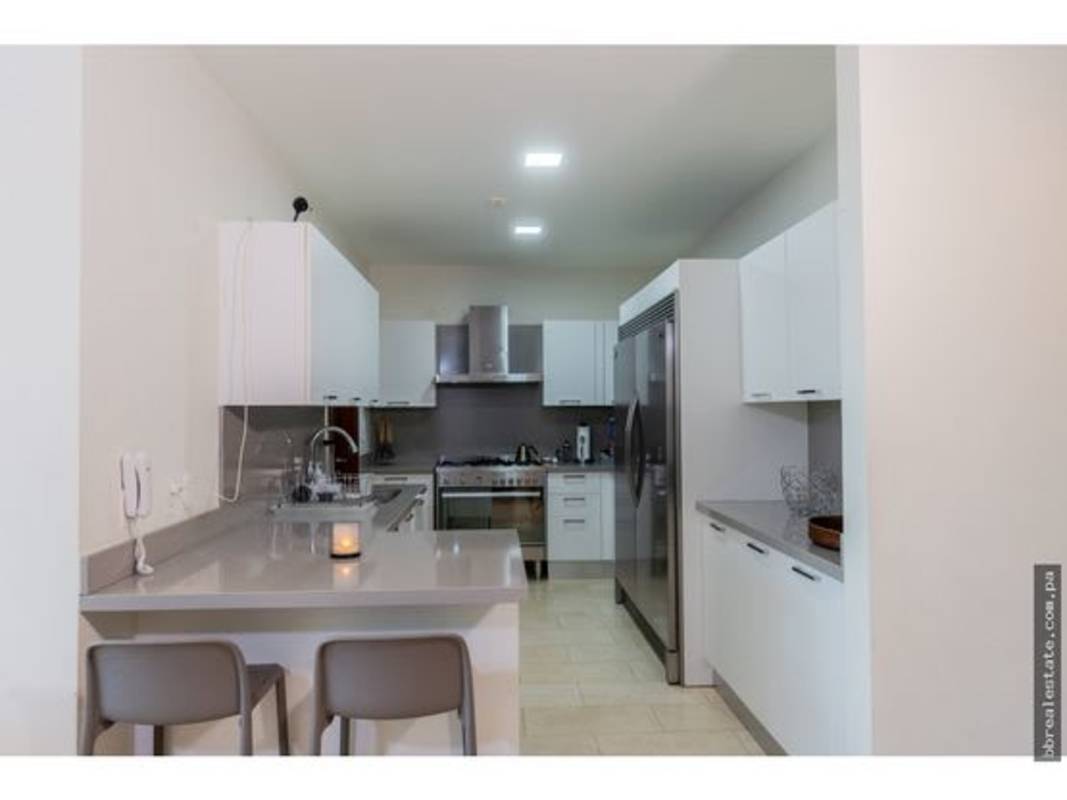 Spacious kitchen with granite counters, stainless appliances, breakfast bar at PH Greenview