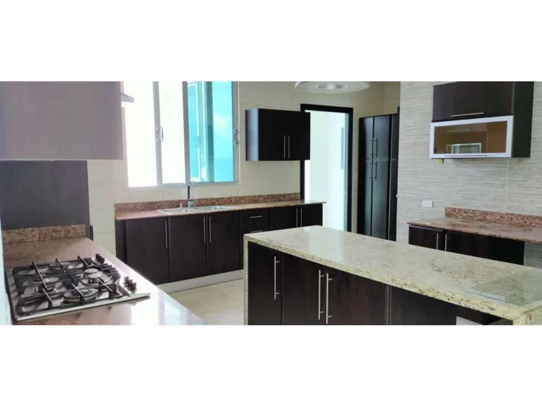 Modern kitchen with granite island and built-ins Ocean Two Tower Panama