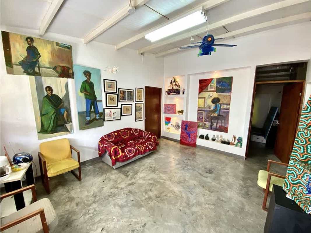 Exterior side walkway with chain-link fence, barbed wire, security features in San Francisco Panama