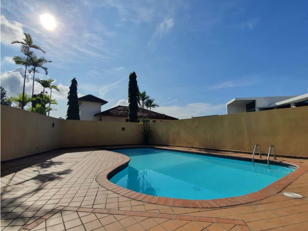 Large traditional kitchen with granite countertops and modern appliances in Los Guayacanes house