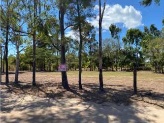 Vacant development land plot with mature trees located in Sea Cliff Coclé Panama