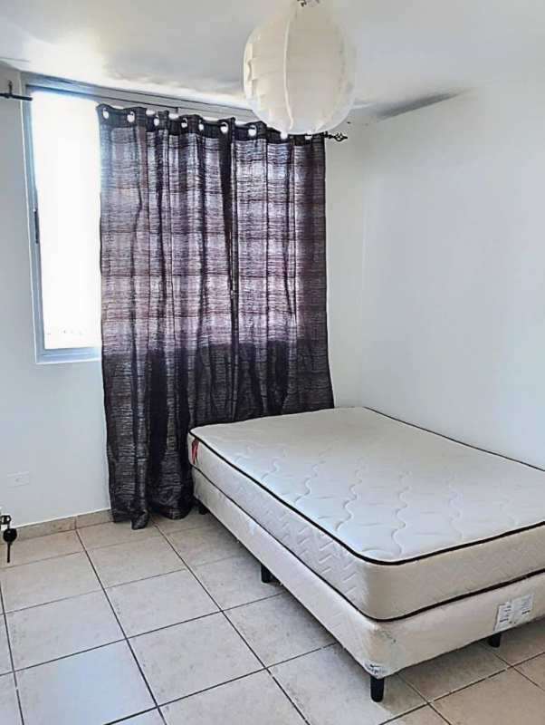Rental room with double bed, balcony access, tiled floor, minimalist decor PH Vista Bella Carrasquilla Panama City