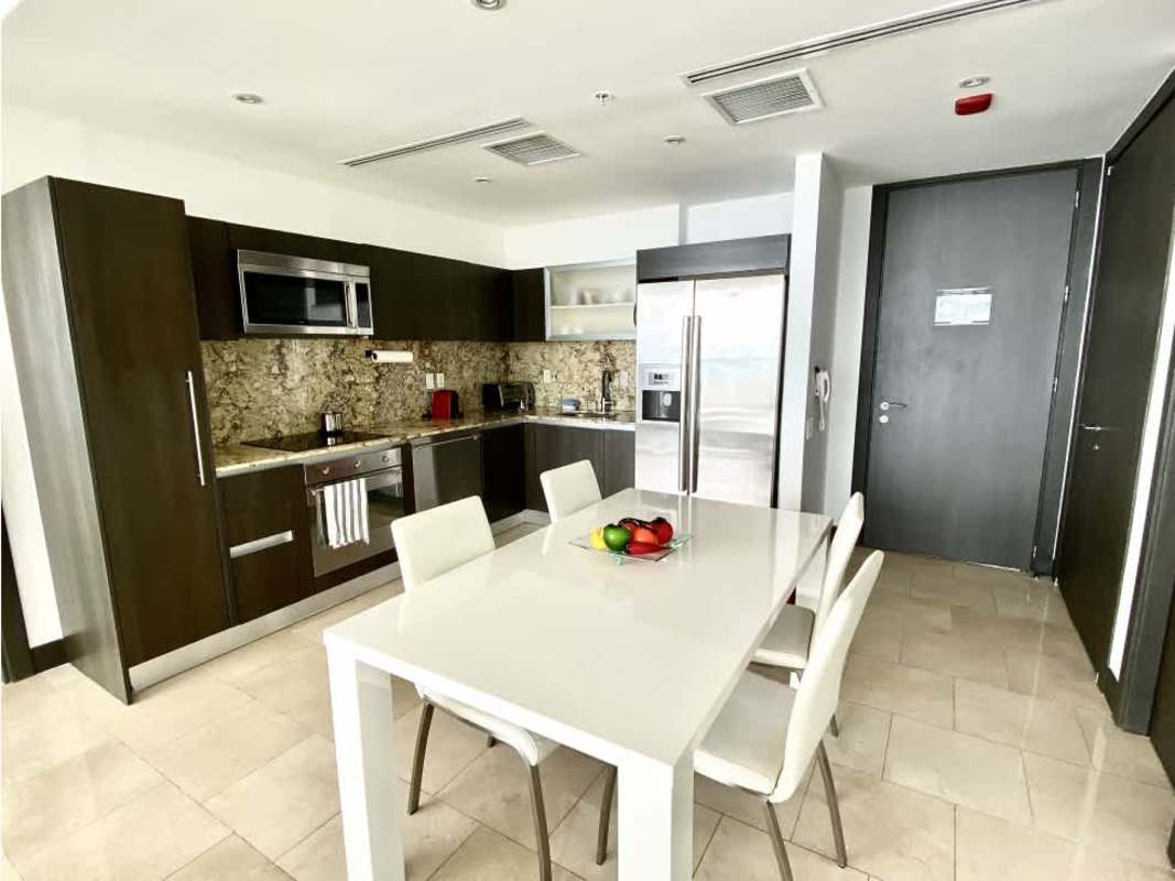 Living dining room with city and sea view high floor JW Marriott Panama