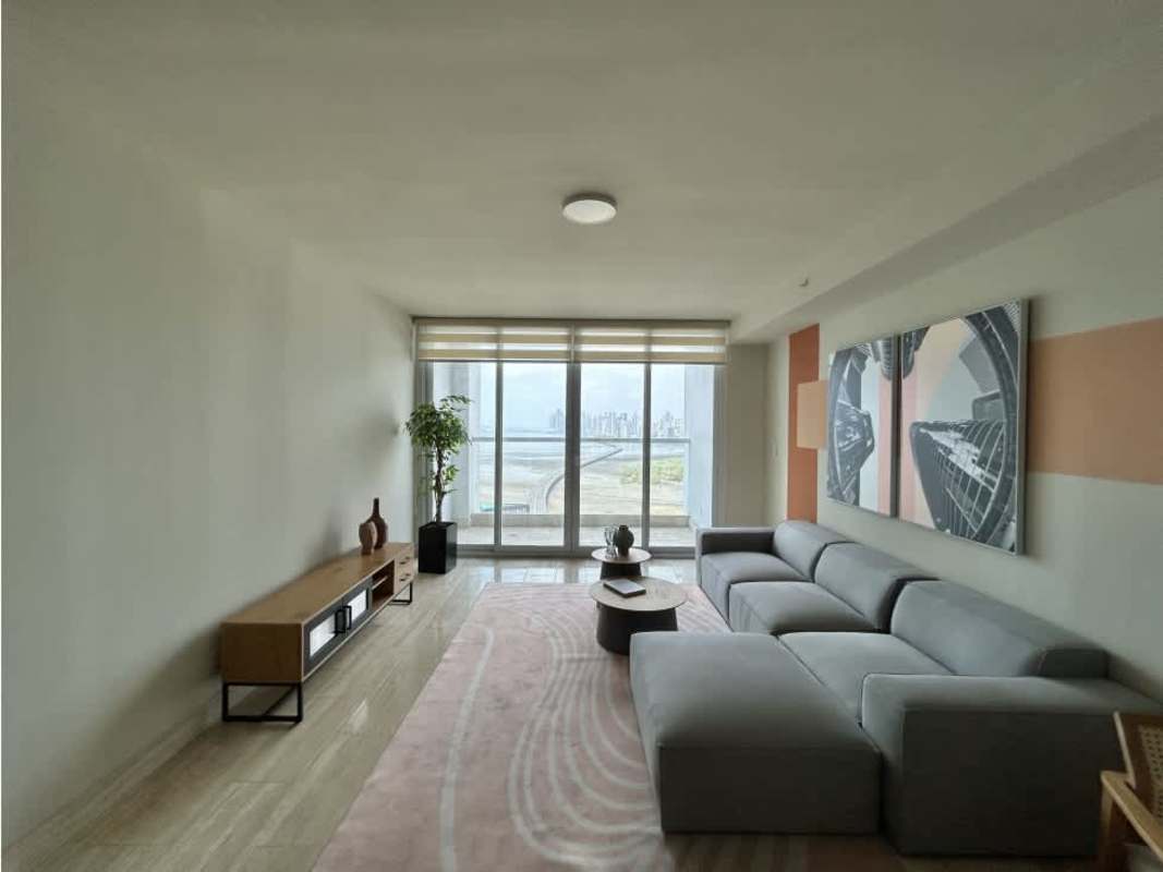 Master bedroom with large windows and stunning city skyline view in The Regent Costa del Este Panama