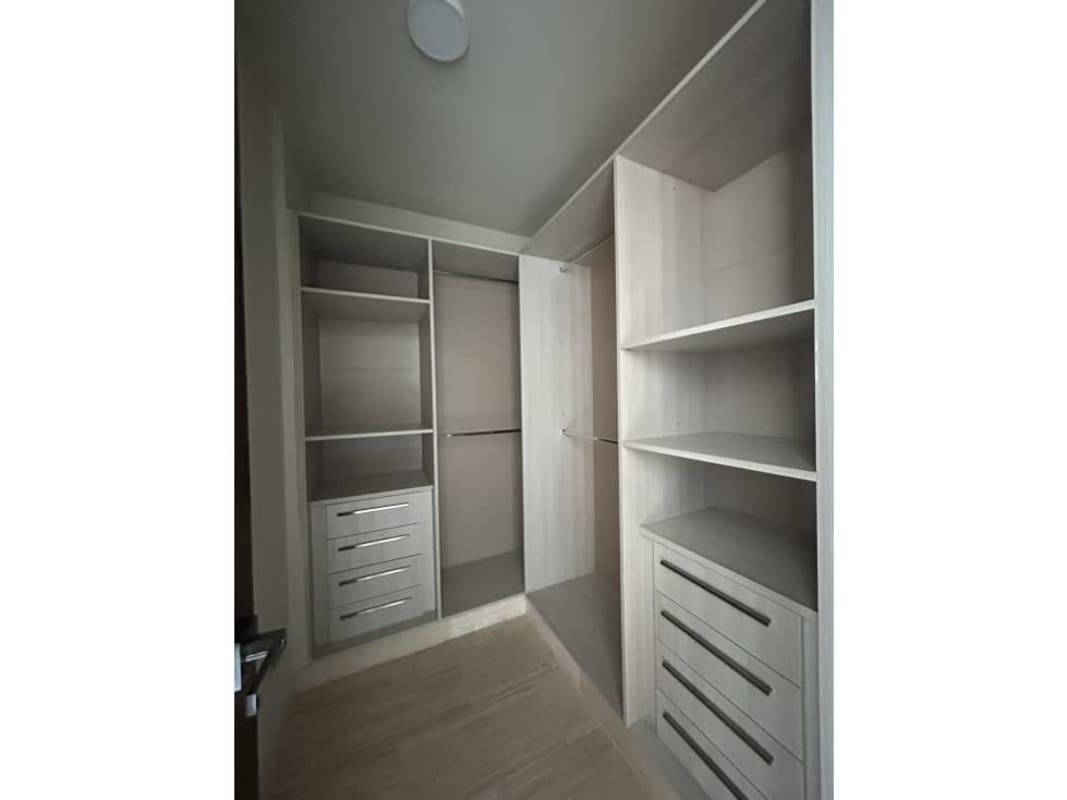 Modern kitchen with granite counters and full appliances in PH The Regent Costa del Este Panama