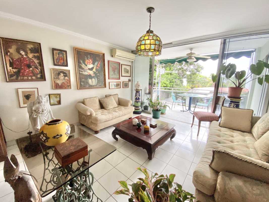 Functional kitchen with granite countertops and white cabinets Coco del Mar Panama City apartment