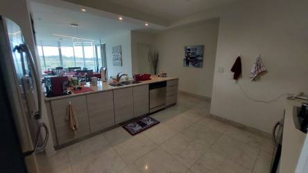 Designer bathroom with marble counters and glass shower in Casa Bonita Panama