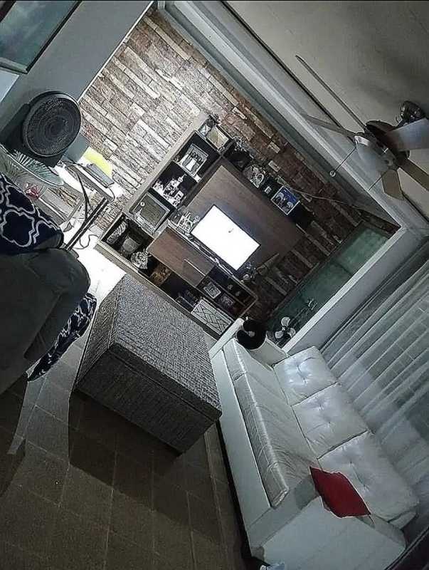 Living room with white leather sofa, stone accent wall and natural light Santa Clara Panama