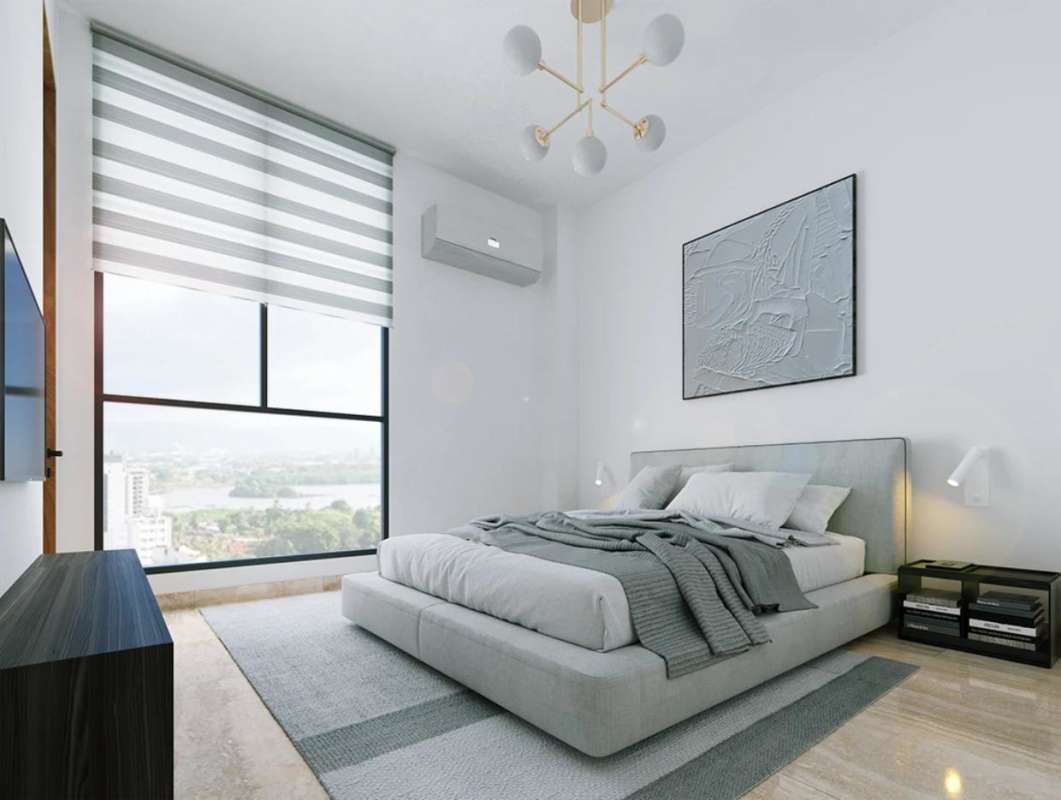 Luxurious infinity rooftop pool with panoramic ocean and city skyline views at PH Riviera del Mar