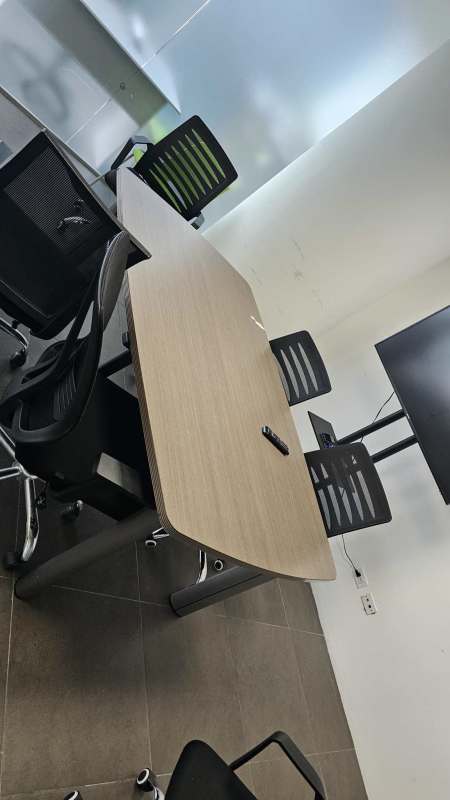 Collaborative office workspace with conference table, bright interiors in Oceania Business Plaza Panama City