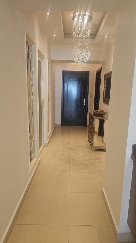 Elegant master suite with floor-to-ceiling windows and ocean views in PH Rivage Tower Avenida Balboa