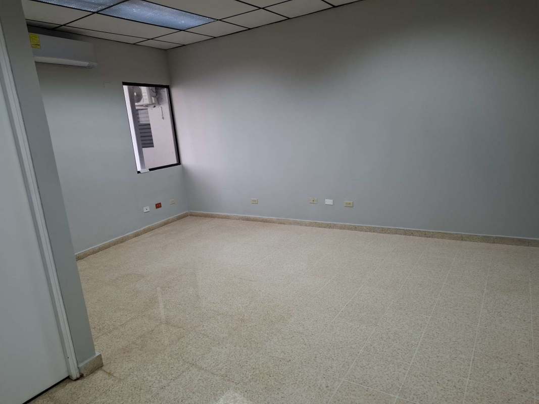 Interior of available office space with AC and granite floor in Villa de las Fuentes Panama